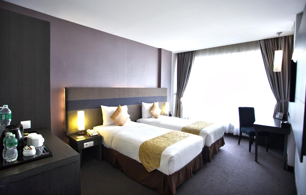 Tjokro Hotel Pekanbaru Phòng bức ảnh