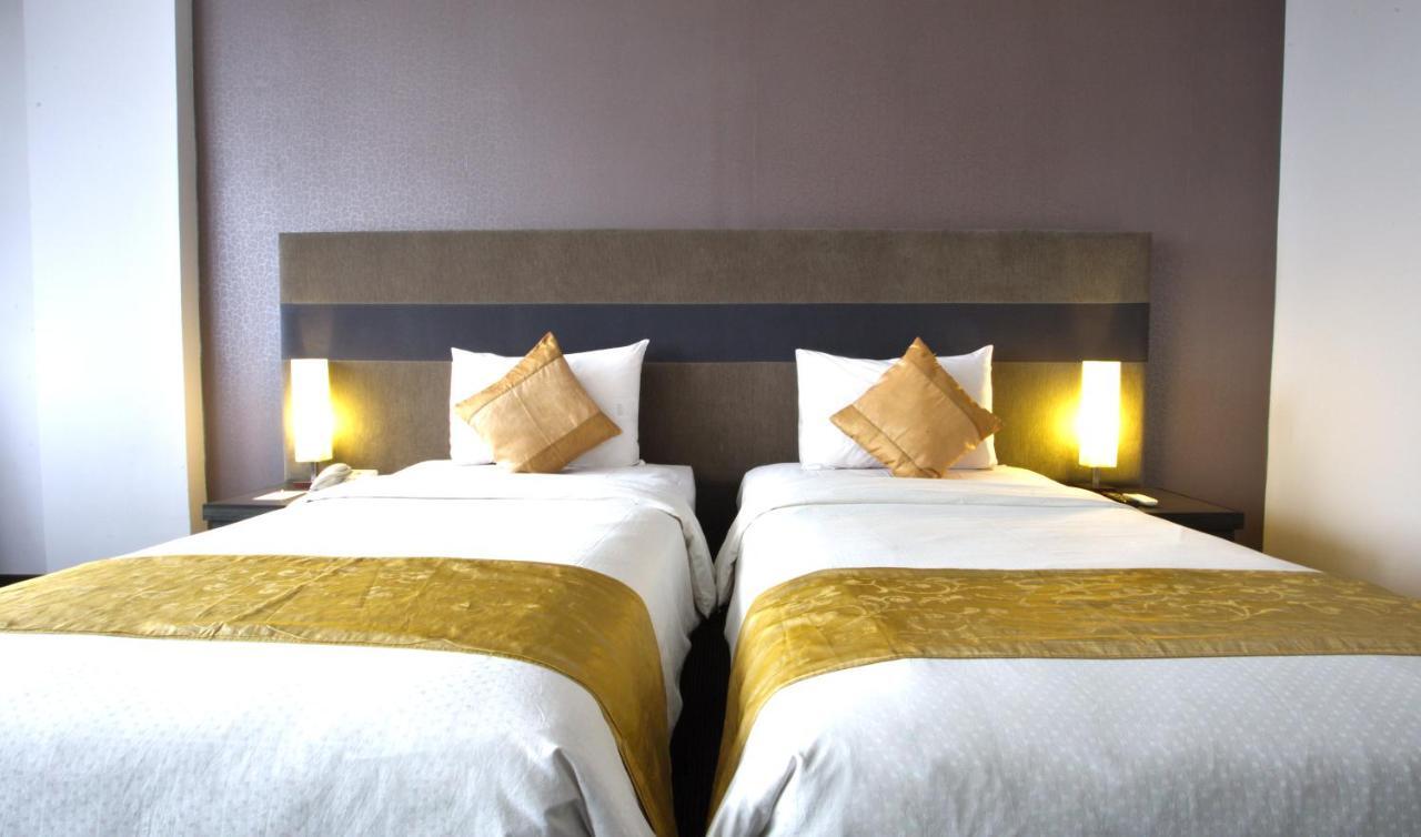 Tjokro Hotel Pekanbaru Phòng bức ảnh
